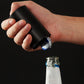 Magnetic bottle opener with push function
